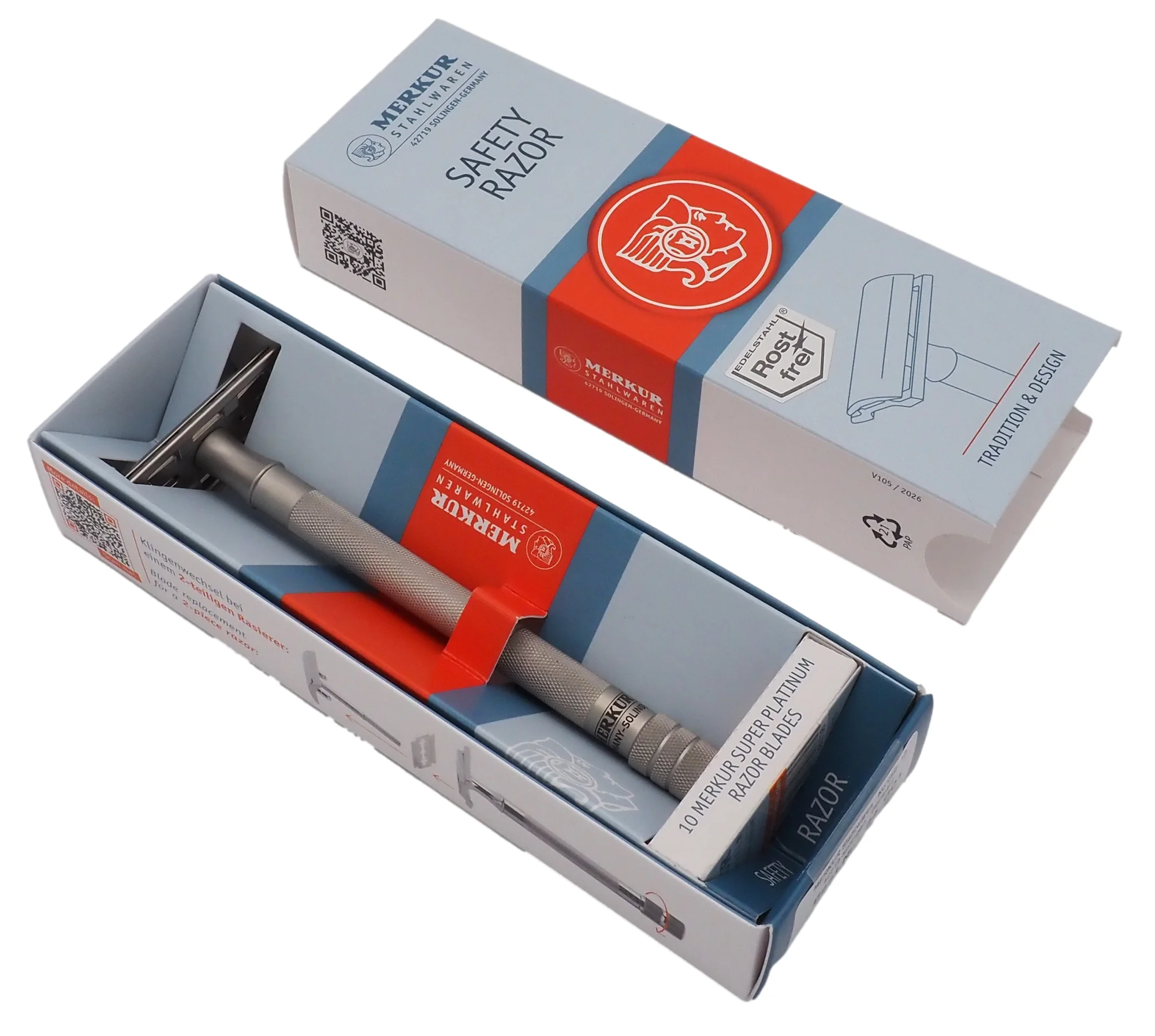 MERKUR 24 INOX safety razor in its blue and orange box with blades